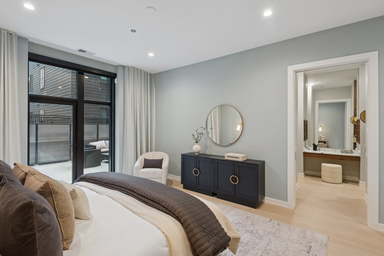 123 South Peoria Street, Unit P2 Chicago, IL 60607 - Photo 24 of 50 a bedroom with a bed and a large window