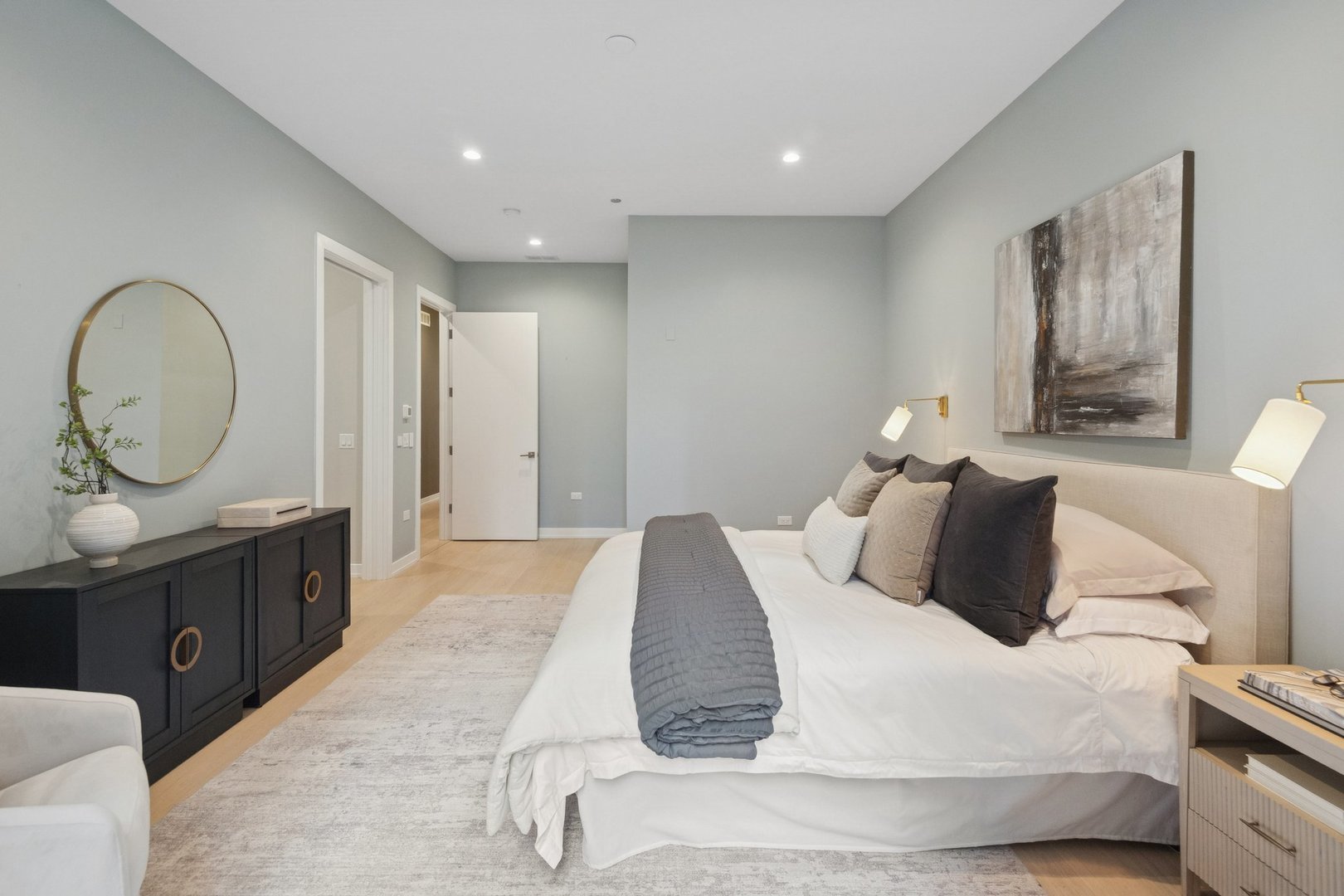 123 South Peoria Street, Unit P2 Chicago, IL 60607 - Photo 25 of 50 a bedroom with a large bed and a chandelier