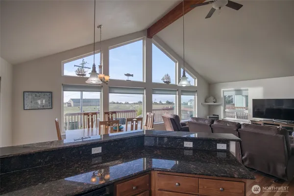 a kitchen with granite countertop lots of counter top space