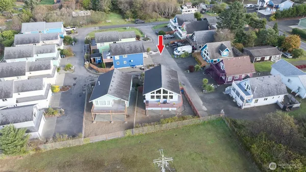 an aerial view of a house with outdoor space