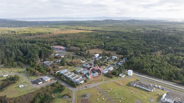 a view of a city with mountains in the background