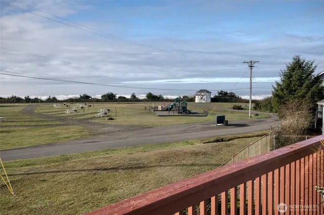 a view of a lake with a big yard