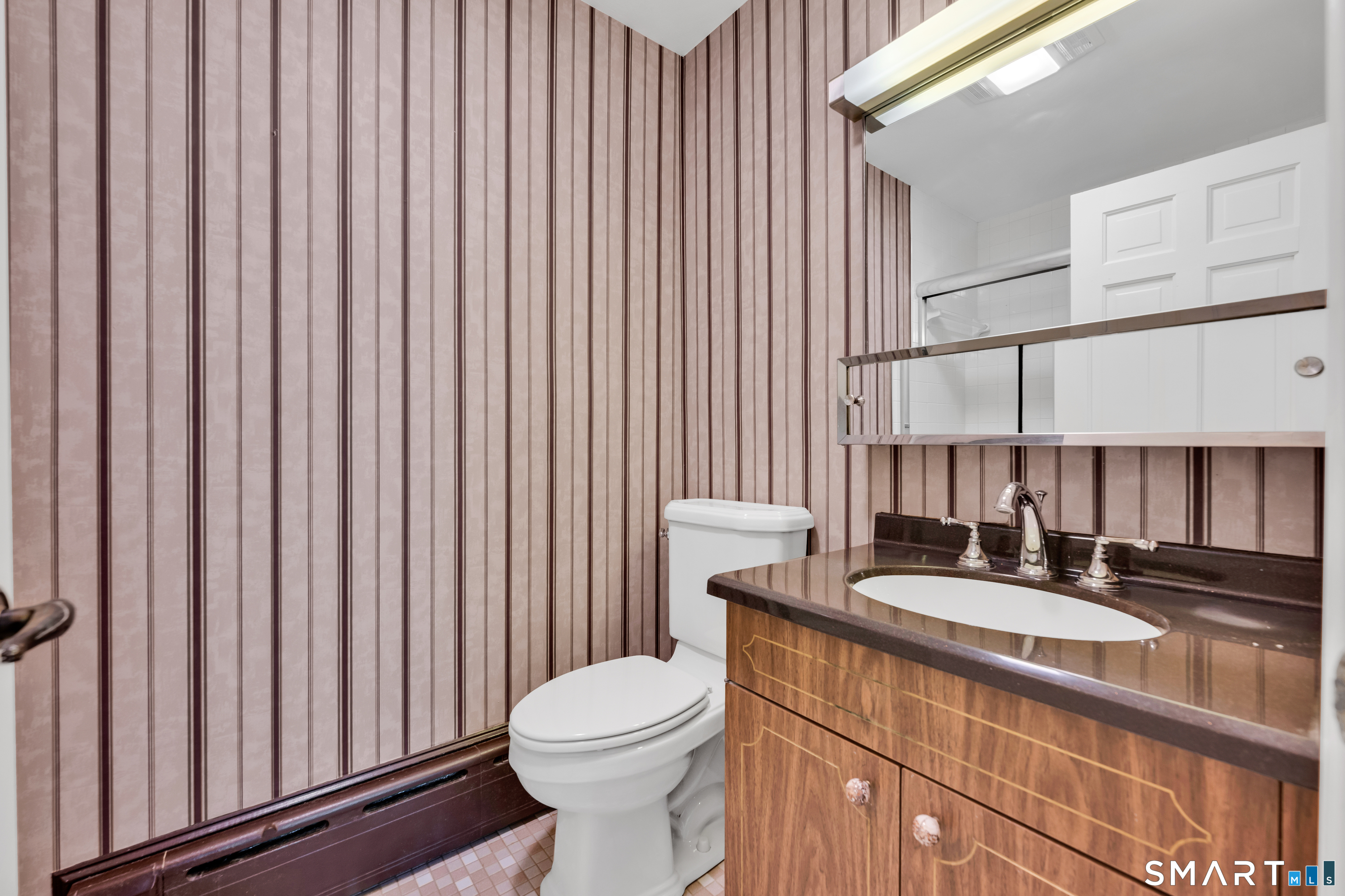 232 Maybrook Road Waterbury, CT 06708 - Photo 19 of 38 a bathroom with a sink a toilet and shower