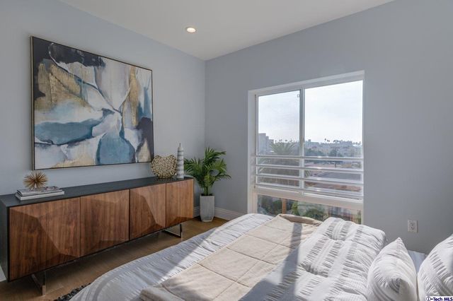 a dining room with a table and chairs
