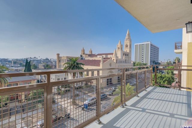 a bathroom with a sink double vanity and a toilet