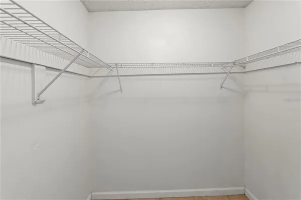 a view of a room with racks on the wall