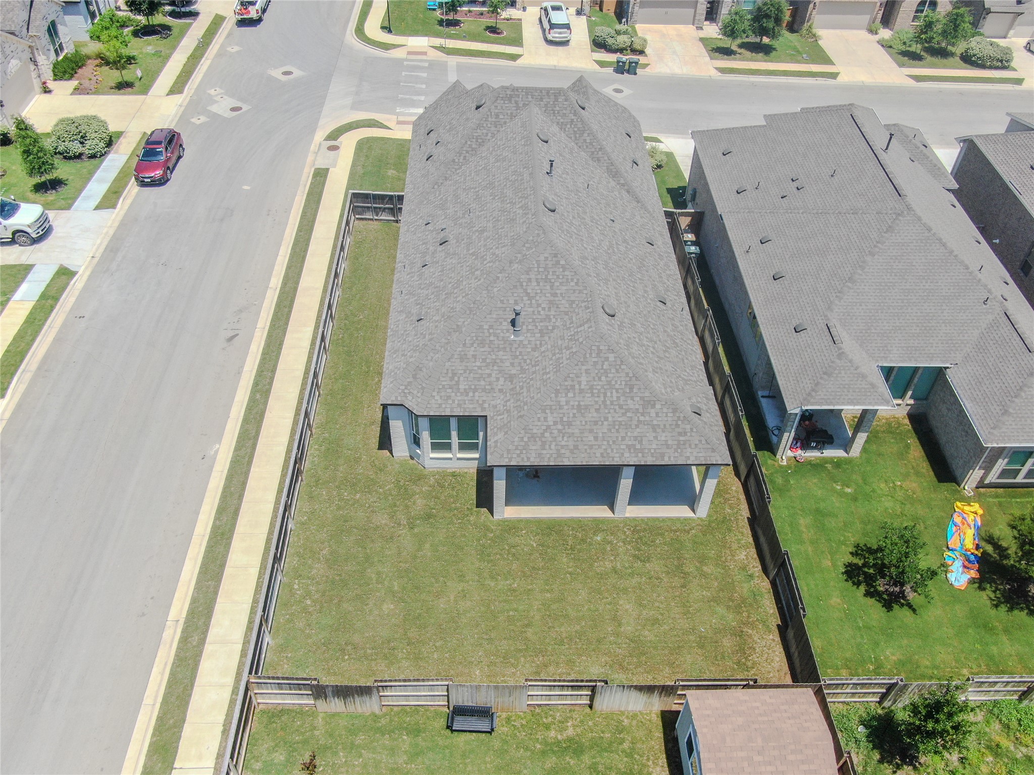 249 Heartleaf Road San Marcos, TX 78666 - Photo 13 of 38 An aerial perspective reveals a well-maintained yard and the spacious rear of the residence.