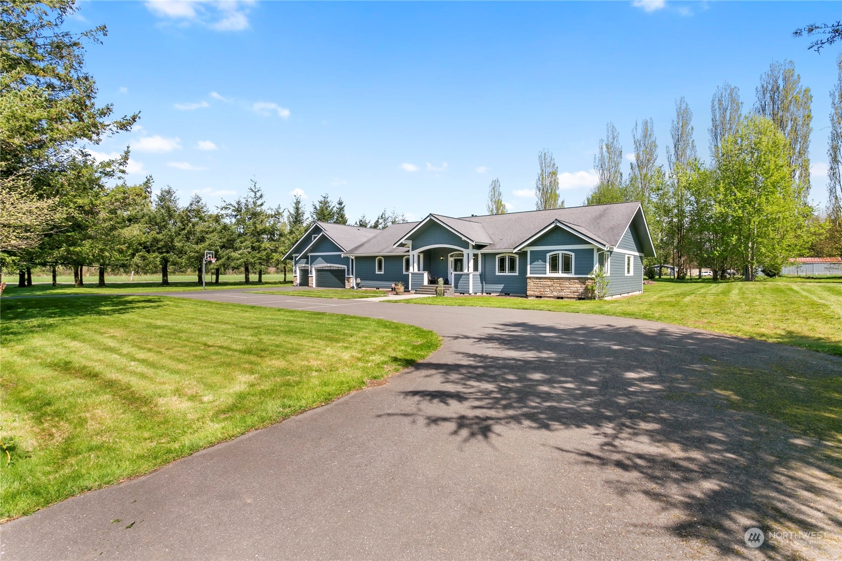 6082 Old Guide Road Bellingham, WA 98226 - Photo 1 of 39 a view of an house with swimming pool and yard