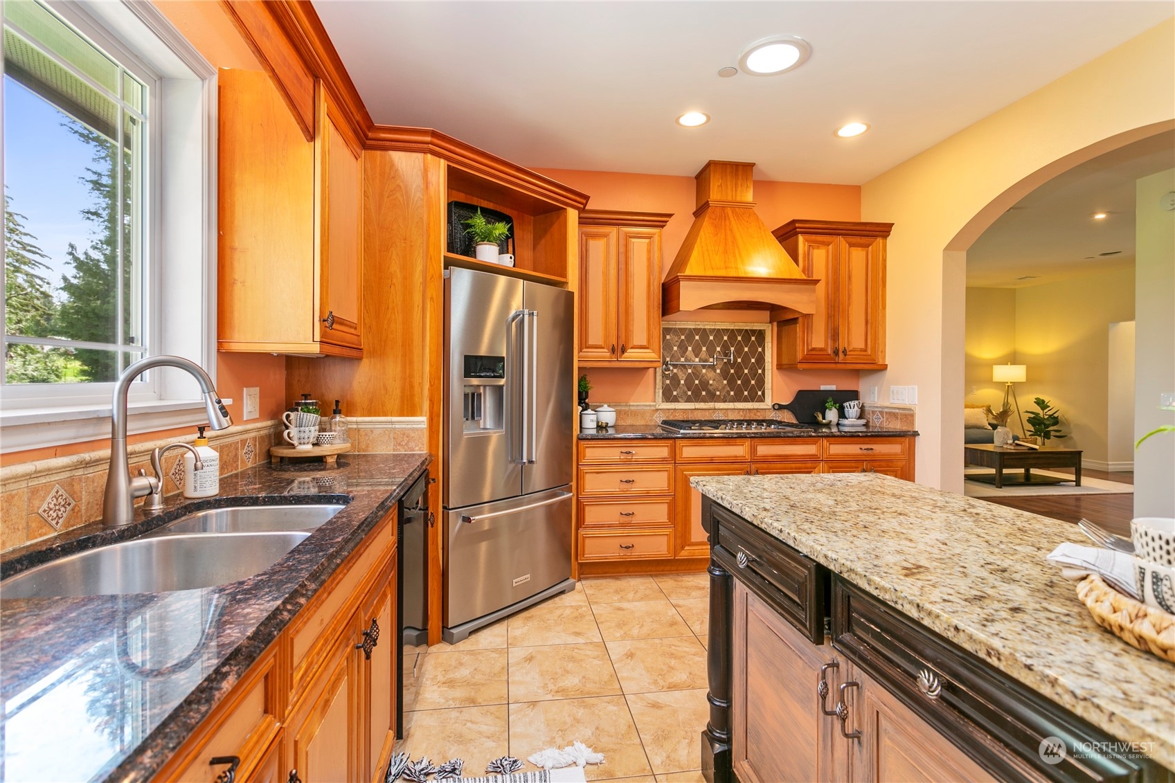6082 Old Guide Road Bellingham, WA 98226 - Photo 11 of 39 a kitchen with stainless steel appliances granite countertop a sink a stove and a refrigerator