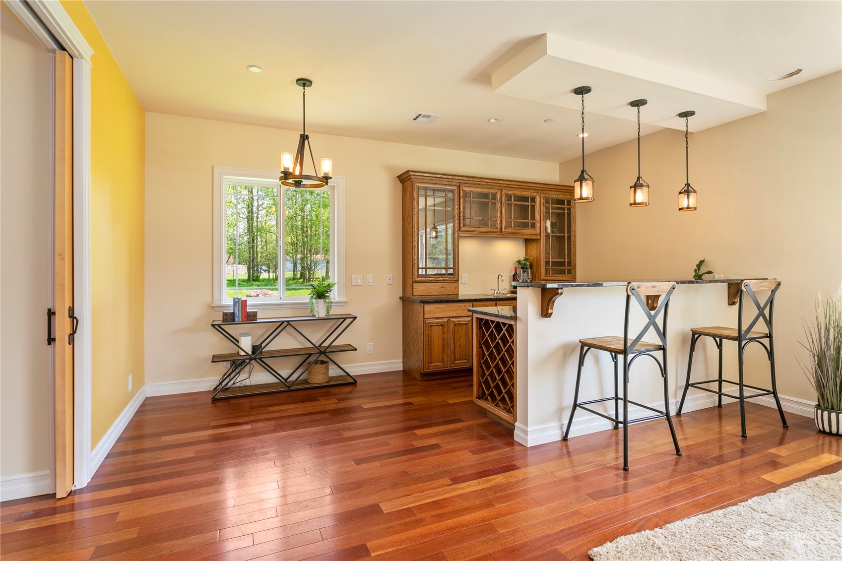 6082 Old Guide Road Bellingham, WA 98226 - Photo 12 of 39 a view of a dining room with furniture window and wooden floor