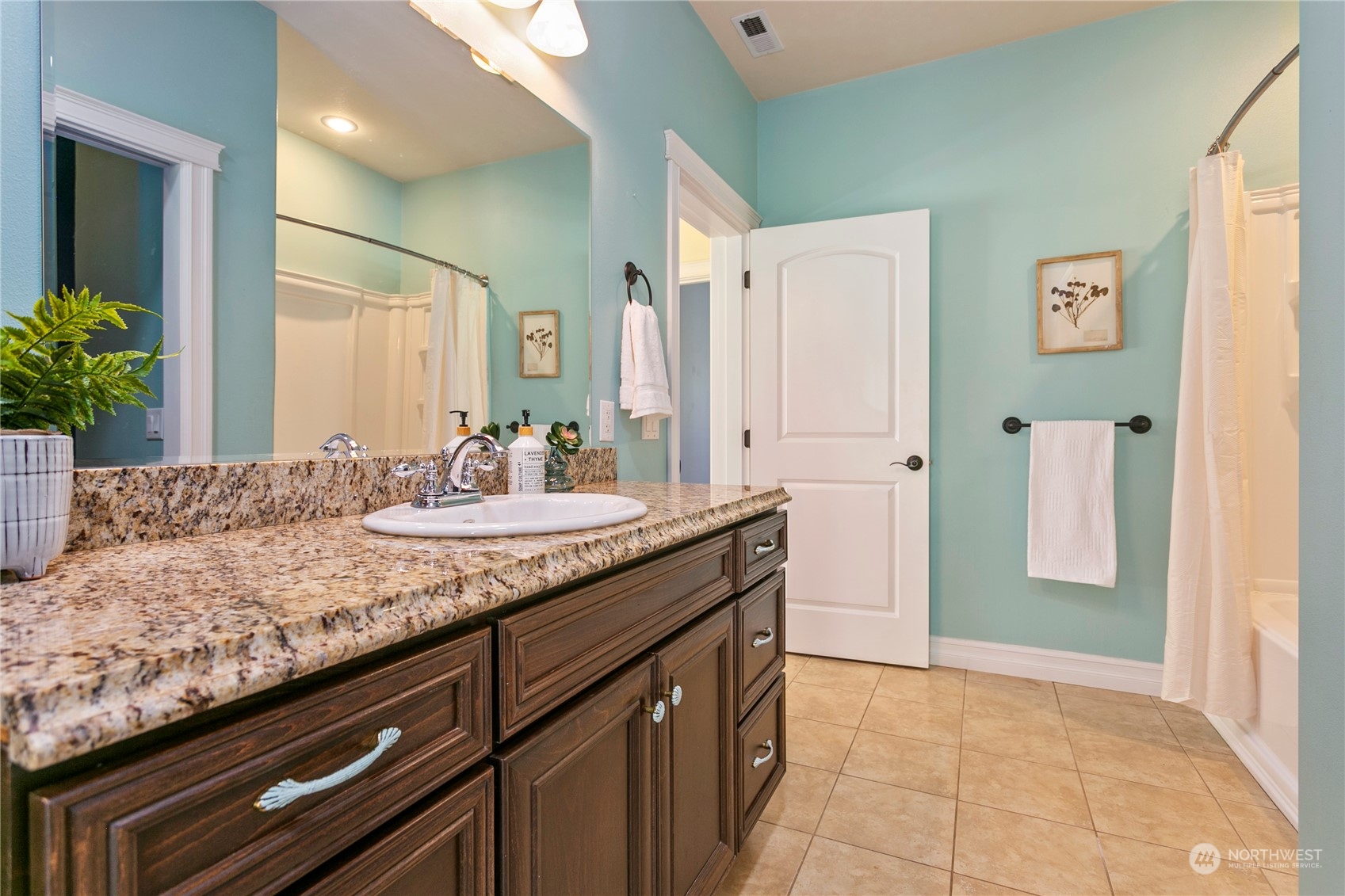 6082 Old Guide Road Bellingham, WA 98226 - Photo 20 of 39 a bathroom with a granite countertop sink and a mirror