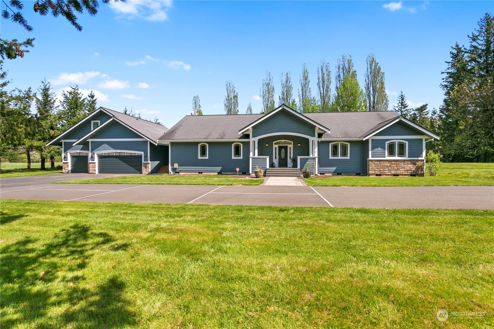 6082 Old Guide Road Bellingham, WA 98226 - Photo 2 of 39 a front view of a house with a yard