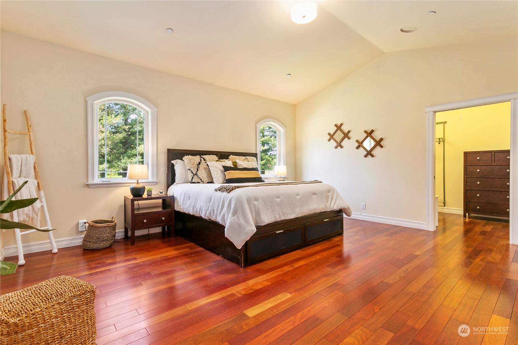6082 Old Guide Road Bellingham, WA 98226 - Photo 21 of 39 a bedroom with a bed lamps and wooden floor