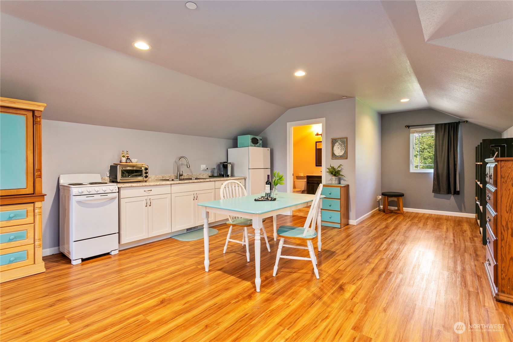 6082 Old Guide Road Bellingham, WA 98226 - Photo 30 of 39 a kitchen with a sink and chairs