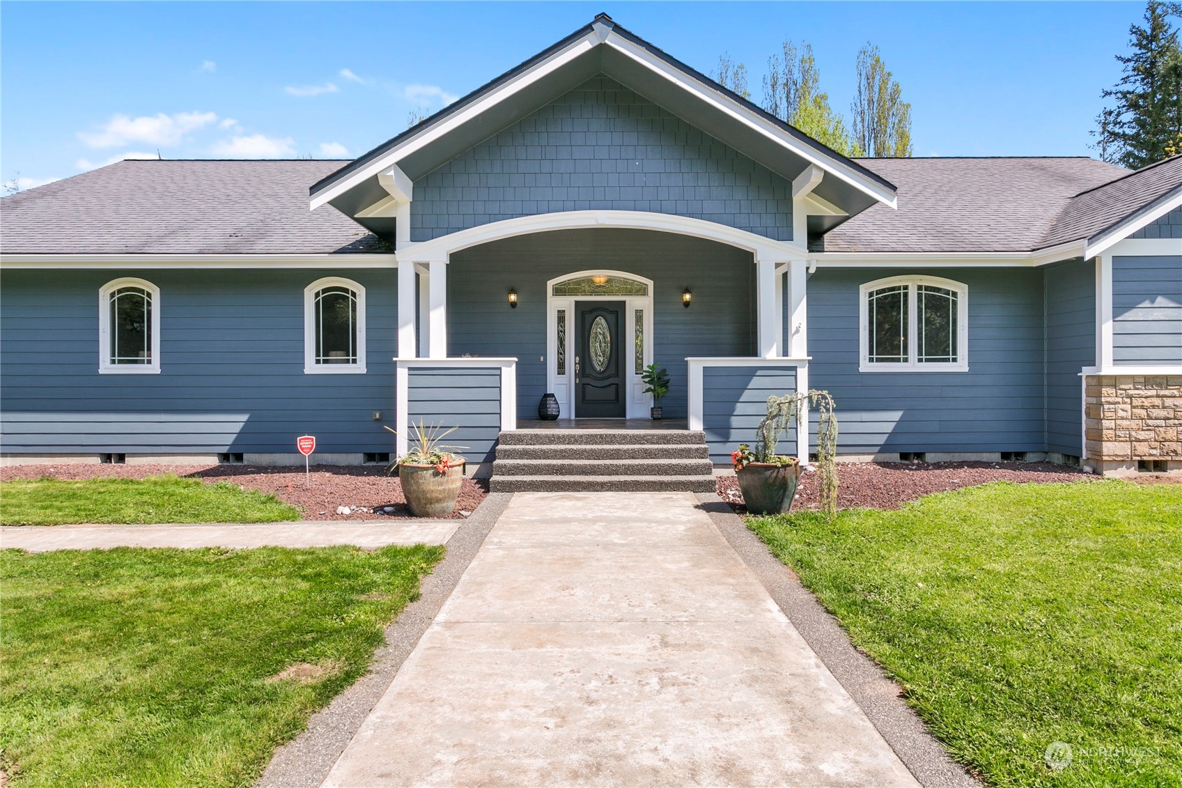 6082 Old Guide Road Bellingham, WA 98226 - Photo 3 of 39 a front view of a house with a yard