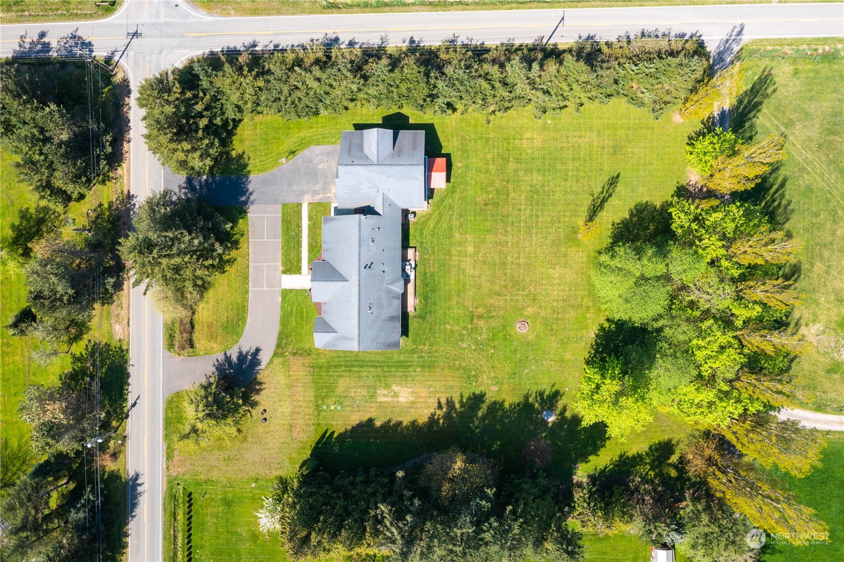 6082 Old Guide Road Bellingham, WA 98226 - Photo 38 of 39 a aerial view of a house with a yard
