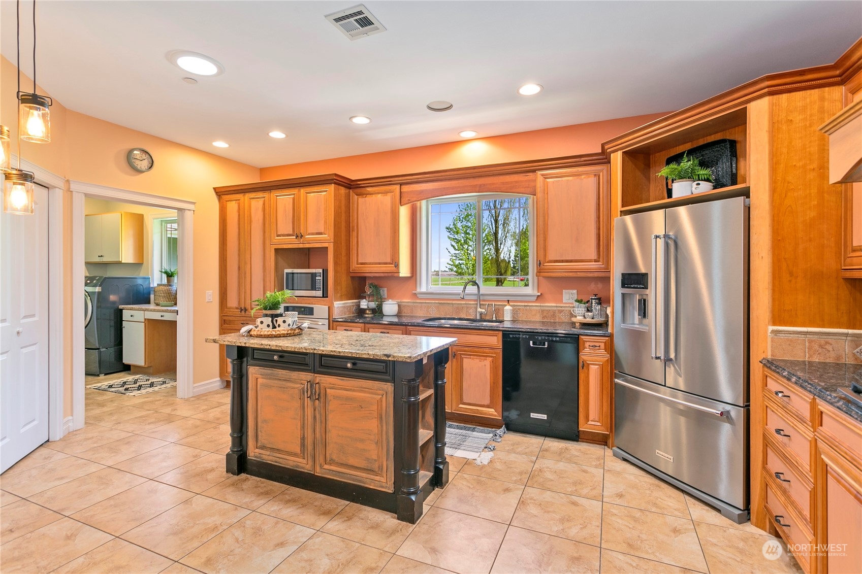 6082 Old Guide Road Bellingham, WA 98226 - Photo 7 of 39 a kitchen with stainless steel appliances granite countertop a refrigerator a sink a stove and oven