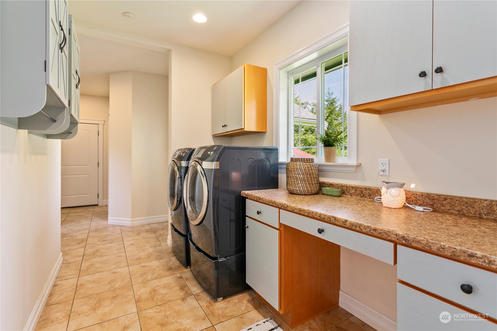 6082 Old Guide Road Bellingham, WA 98226 - Photo 8 of 39 a utility room with stainless steel appliances granite countertop a sink a refrigerator and a window