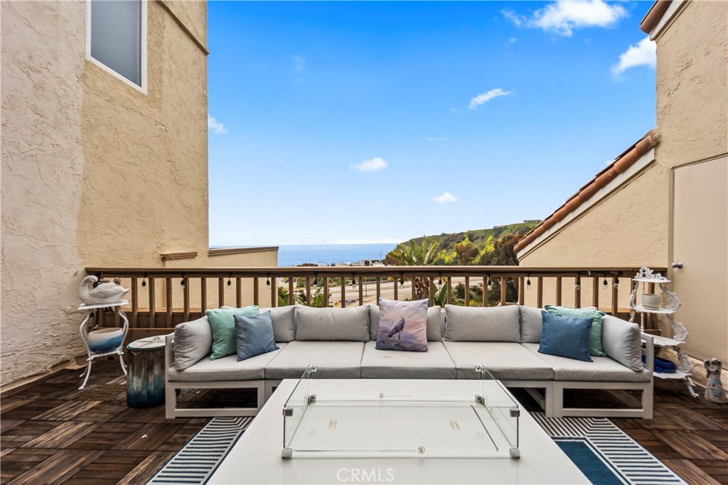 23920 De Ville Way, Unit D Malibu, CA 90265 - Photo 19 of 42 a view of a balcony with furniture