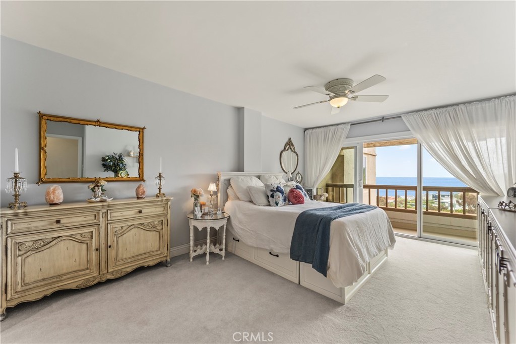 23920 De Ville Way, Unit D Malibu, CA 90265 - Photo 21 of 42 a bed room with two beds and a large window