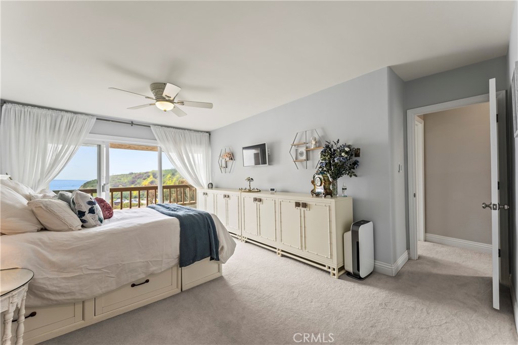 23920 De Ville Way, Unit D Malibu, CA 90265 - Photo 22 of 42 a bedroom with bed and window