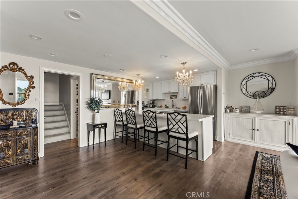 23920 De Ville Way, Unit D Malibu, CA 90265 - Photo 3 of 42 a very nice looking living room with wooden floor and furniture