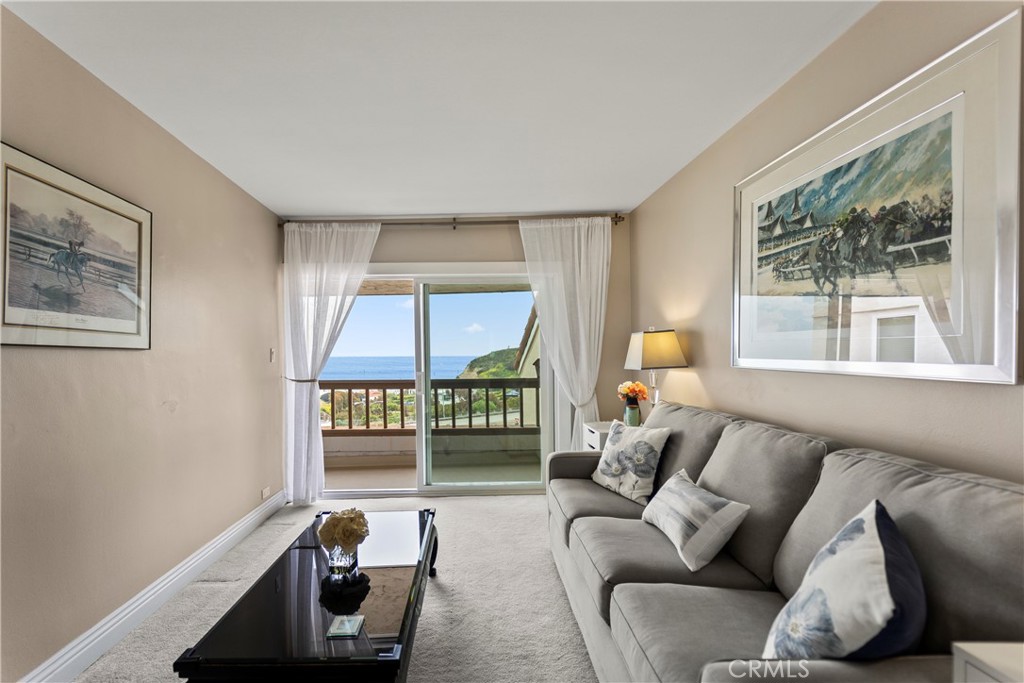 23920 De Ville Way, Unit D Malibu, CA 90265 - Photo 31 of 42 a living room with furniture and a window
