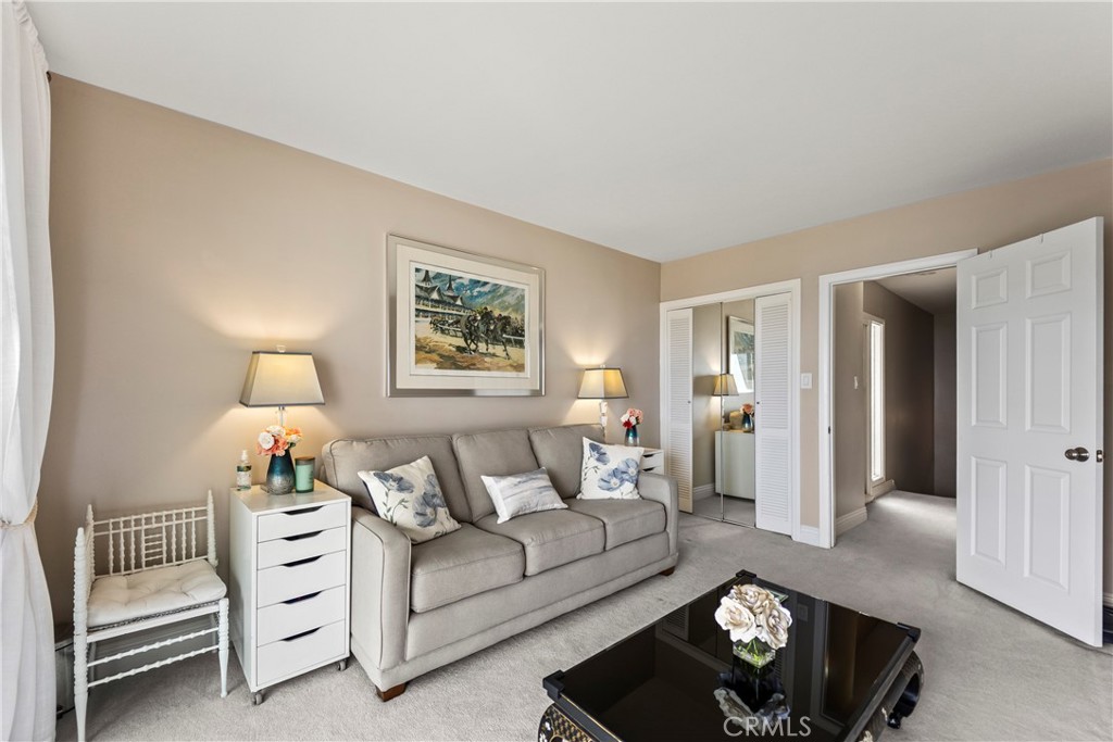 23920 De Ville Way, Unit D Malibu, CA 90265 - Photo 32 of 42 a living room with furniture and a window