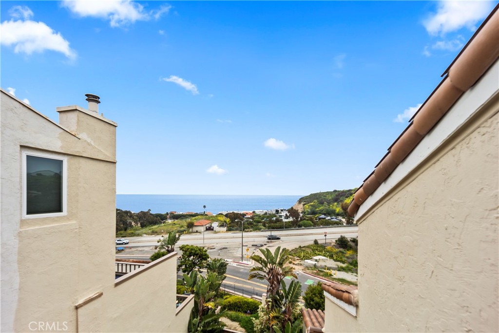 23920 De Ville Way, Unit D Malibu, CA 90265 - Photo 36 of 42 a view of balcony with furniture and city view