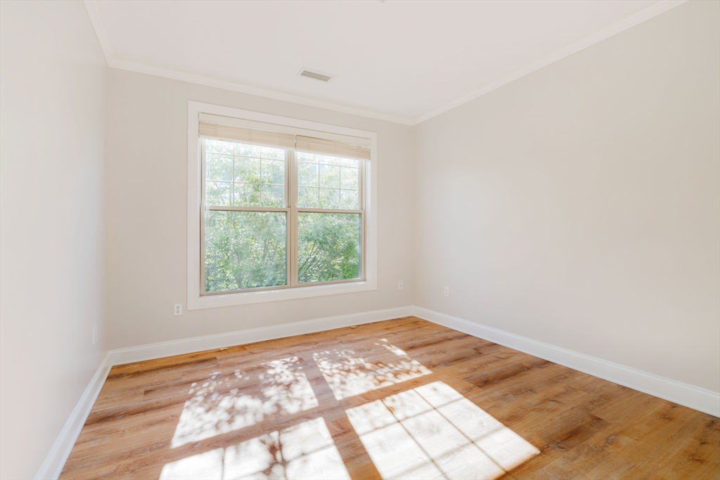 248 Albion Street, Unit 321 Wakefield, MA 01880 - Photo 12 of 19 an empty room with a window