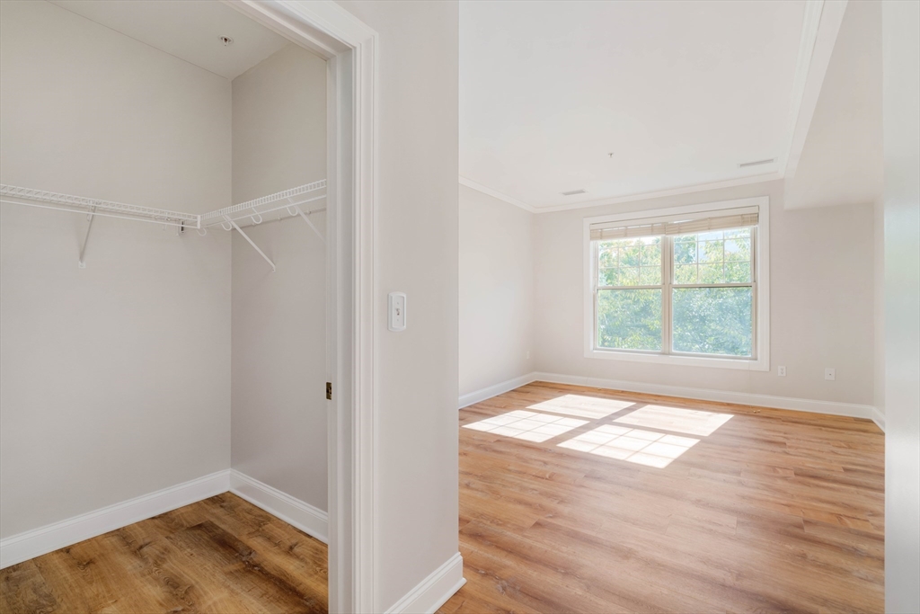 248 Albion Street, Unit 321 Wakefield, MA 01880 - Photo 10 of 19 a view of an empty room and window