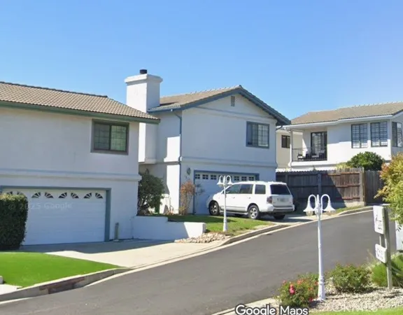 a house view with a outdoor space