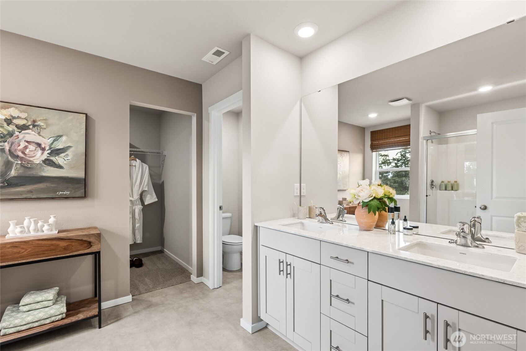 536 Wall Street, Unit 33 Buckley, WA 98321 - Photo 11 of 40 a spacious bathroom with a double vanity sink and a mirror