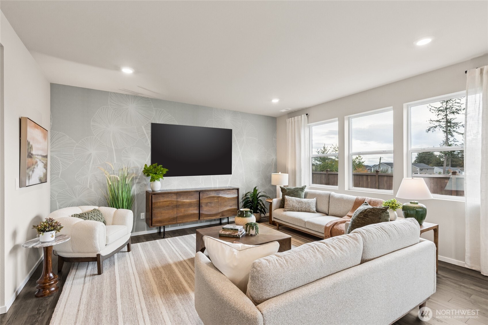 536 Wall Street, Unit 33 Buckley, WA 98321 - Photo 23 of 40 a living room with furniture and a flat screen tv