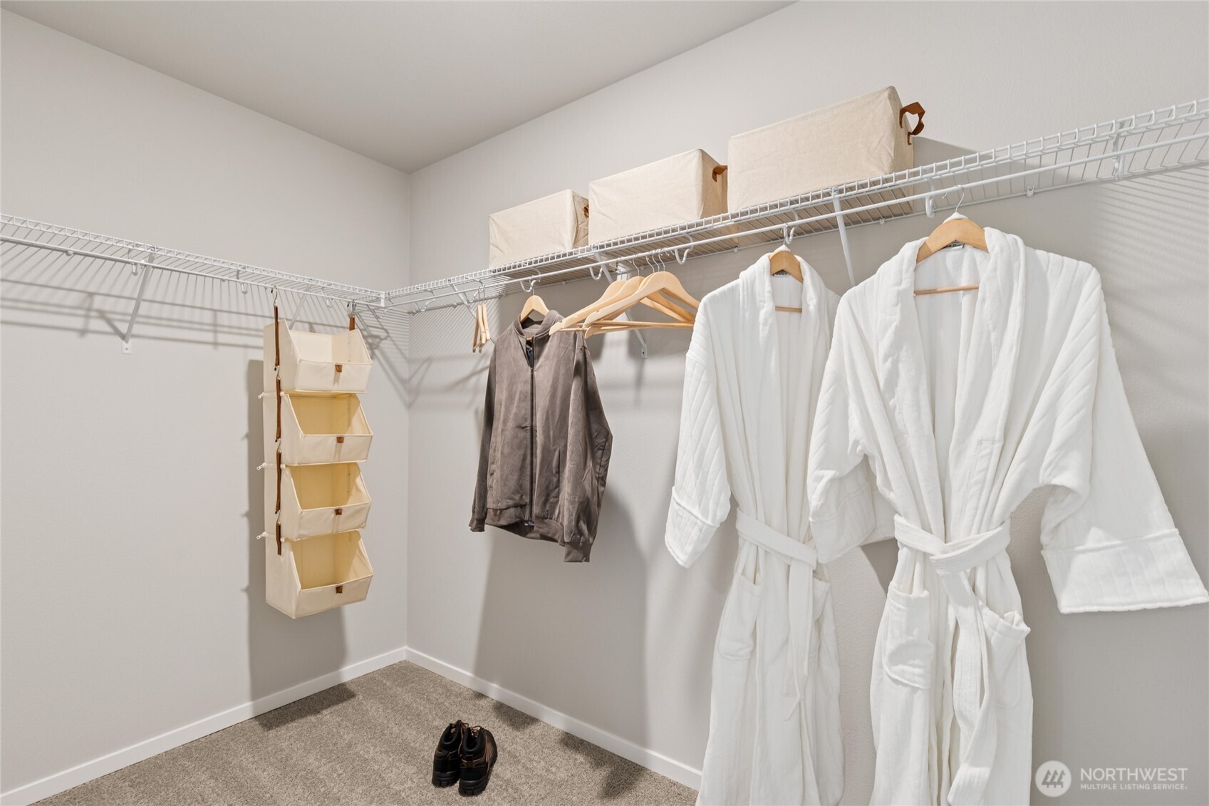 536 Wall Street, Unit 33 Buckley, WA 98321 - Photo 32 of 40 a view of walk in closet with clothes and shoes
