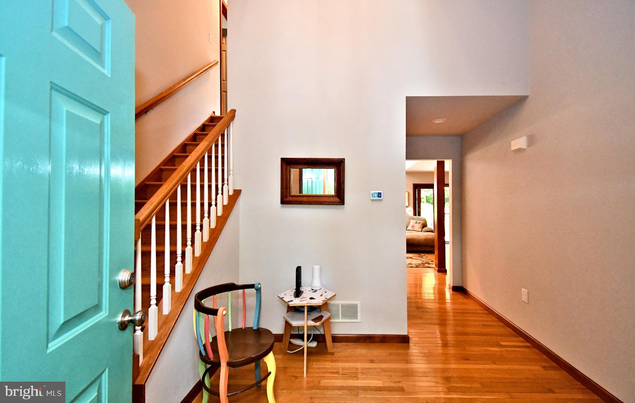 2415 Schaffer Road Pottstown, PA 19464 - Photo 11 of 93 a view of a hallway with wooden floor and staircase
