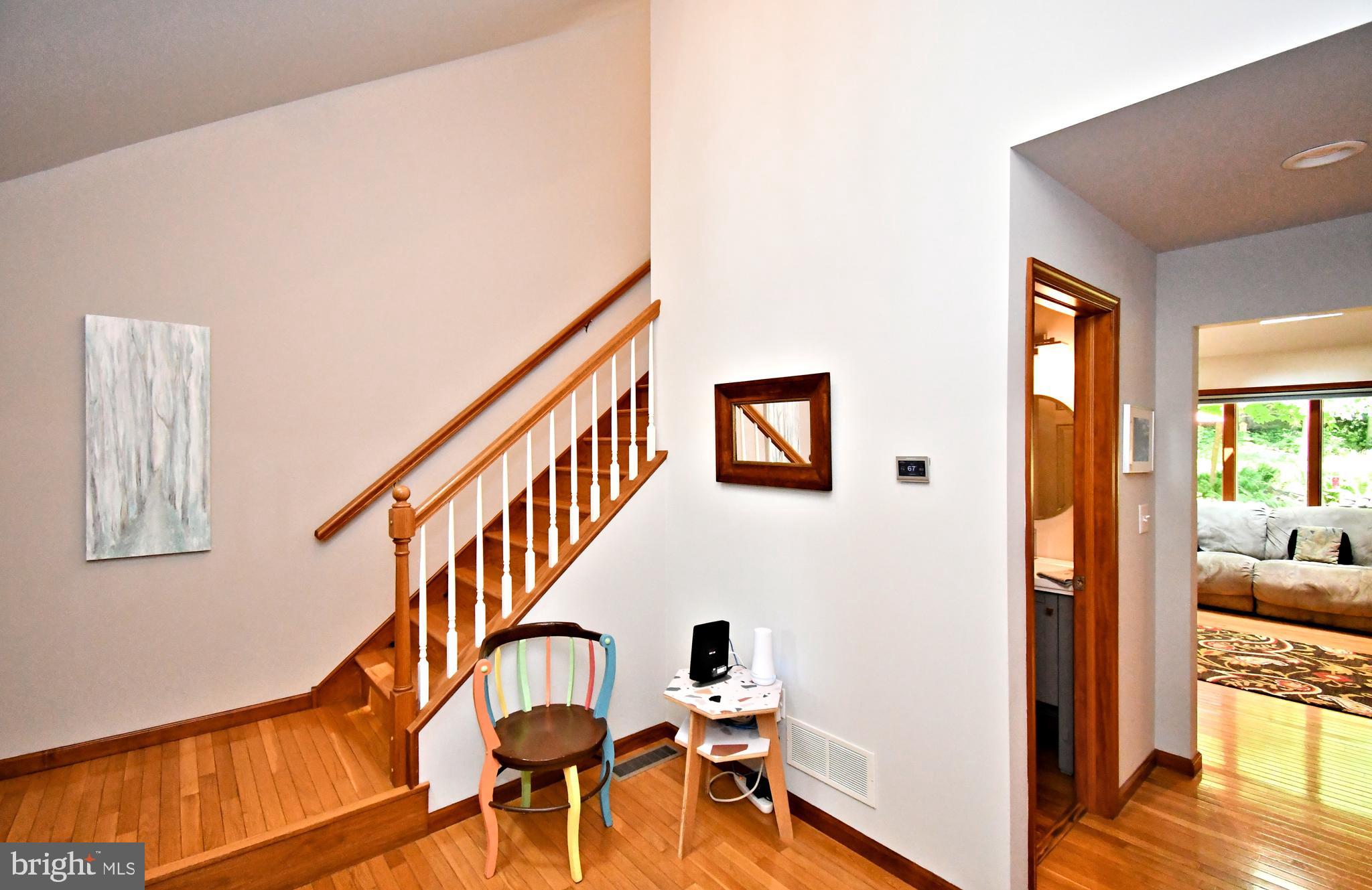 2415 Schaffer Road Pottstown, PA 19464 - Photo 12 of 93 a view of an entryway with wooden floor and a livingroom view