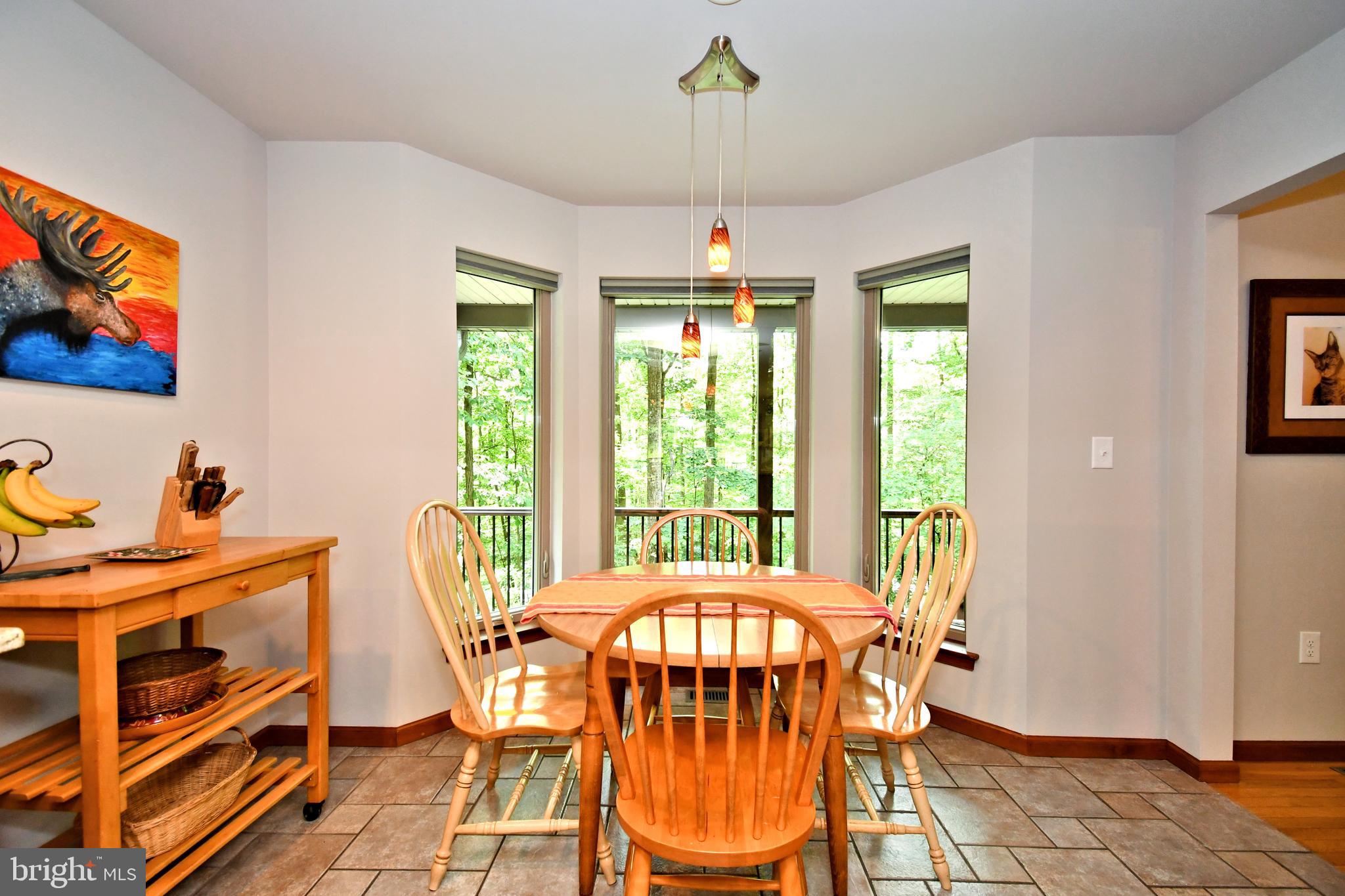 2415 Schaffer Road Pottstown, PA 19464 - Photo 15 of 93 a view of a dining room with furniture window and wooden floor
