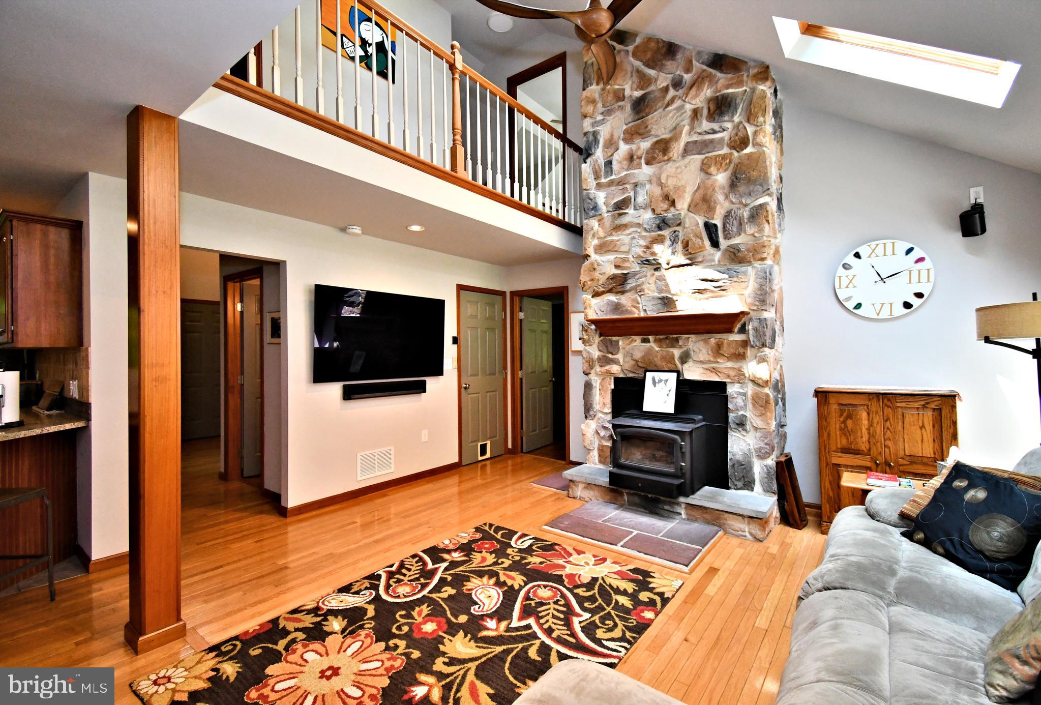2415 Schaffer Road Pottstown, PA 19464 - Photo 26 of 93 a living room with furniture and a flat screen tv