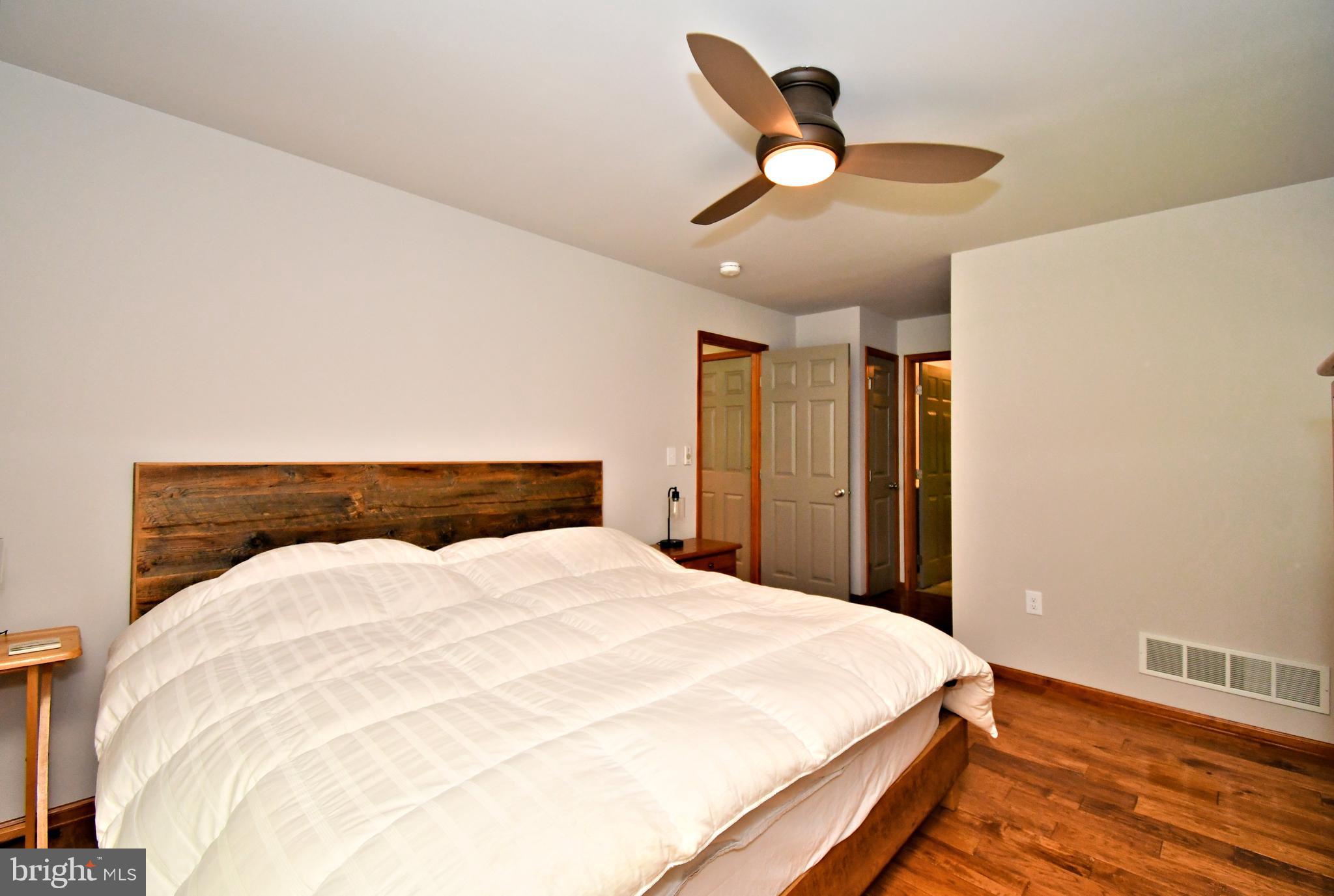 2415 Schaffer Road Pottstown, PA 19464 - Photo 33 of 93 a bed room with a bed and a ceiling fan