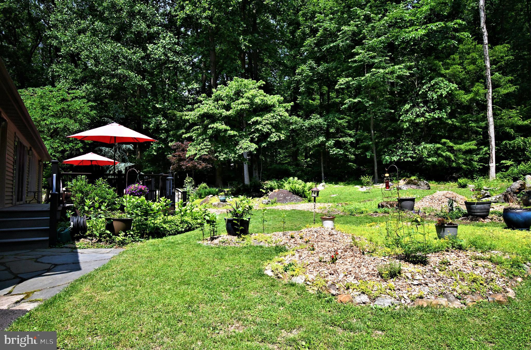 2415 Schaffer Road Pottstown, PA 19464 - Photo 66 of 93 a view of garden with sitting area and furniture