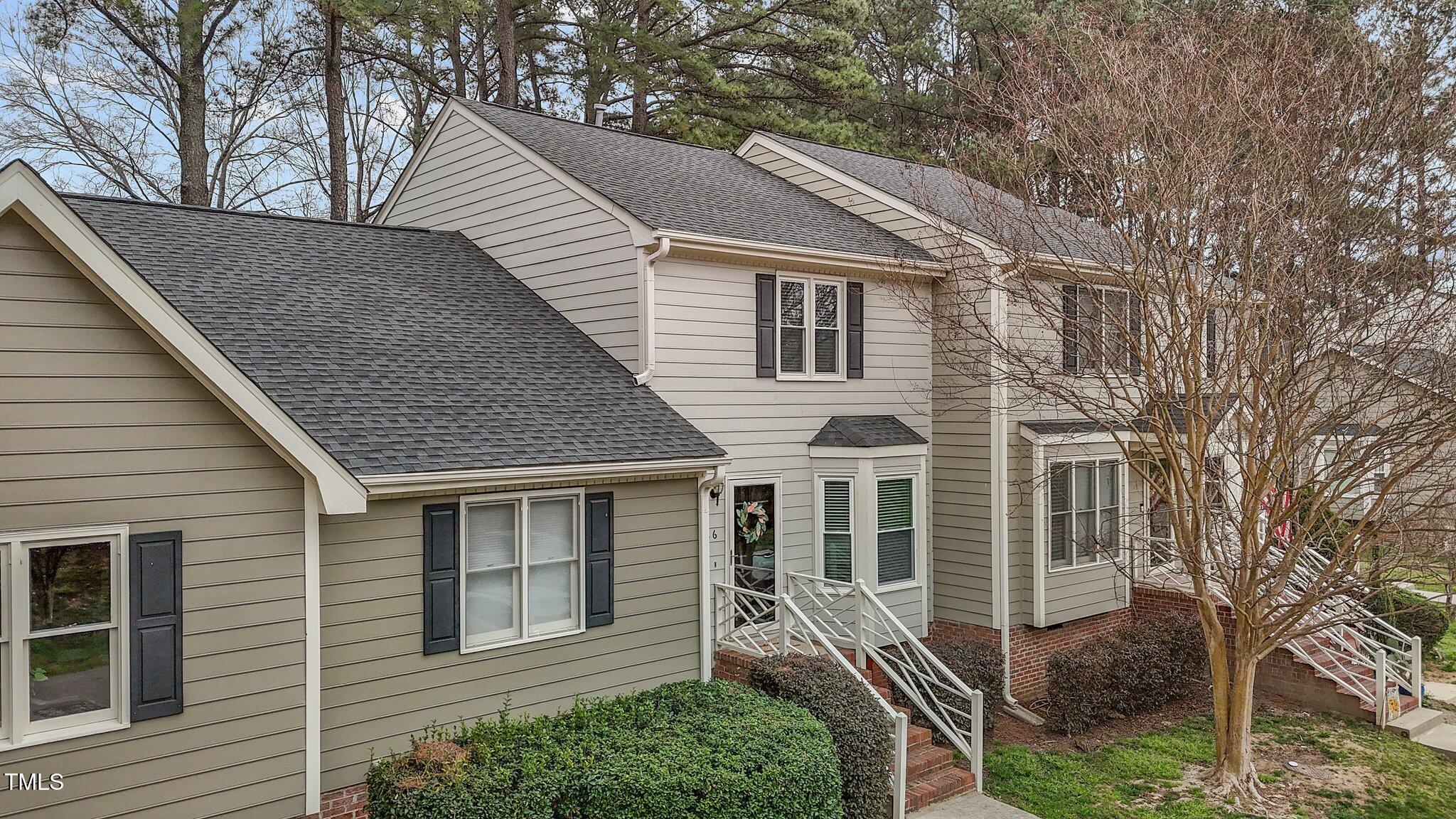 5616 Darrow Drive Raleigh, NC 27612 - Photo 27 of 31 Greenish property to the left is not part of the subject property.
