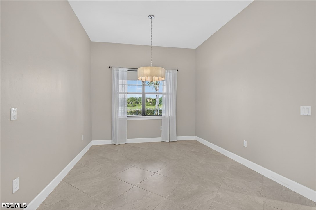 12804 Epping Way Fort Myers, FL 33913 - Photo 14 of 40 an empty room with windows and outdoor view