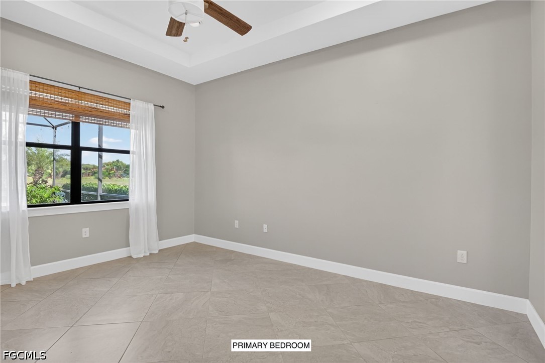 12804 Epping Way Fort Myers, FL 33913 - Photo 17 of 40 an empty room with a window