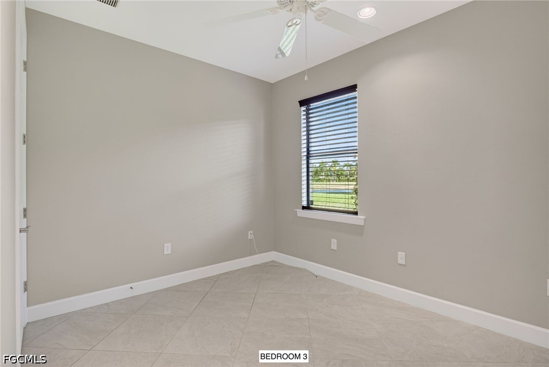 12804 Epping Way Fort Myers, FL 33913 - Photo 26 of 40 an empty room with a window