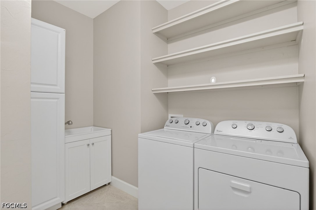 12804 Epping Way Fort Myers, FL 33913 - Photo 29 of 40 a utility room with dryer and washer