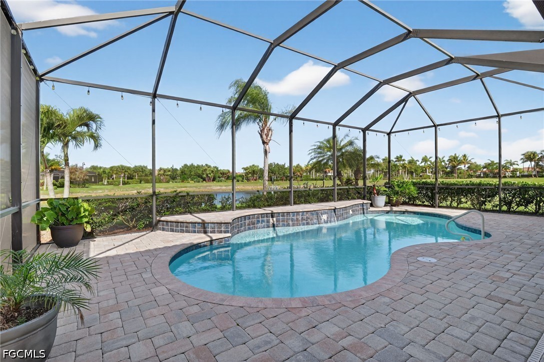 12804 Epping Way Fort Myers, FL 33913 - Photo 32 of 40 a view of a swimming pool with a porch