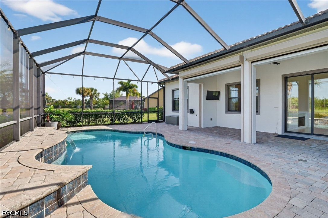 12804 Epping Way Fort Myers, FL 33913 - Photo 33 of 40 a view of a swimming pool with a patio