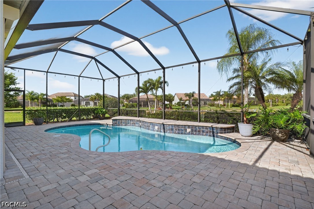 12804 Epping Way Fort Myers, FL 33913 - Photo 35 of 40 a view of a swimming pool with a patio