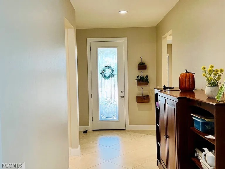 12804 Epping Way Fort Myers, FL 33913 - Photo 5 of 15 a view of hallway with wooden floor